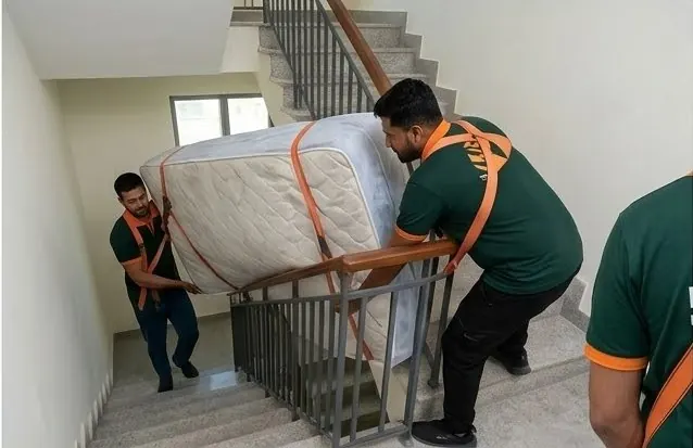 Mattress carried down the stairs